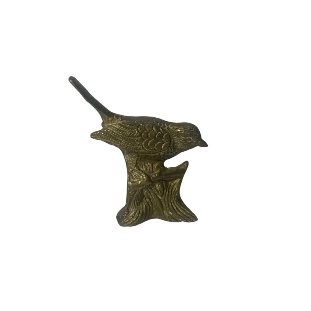 Vintage solid brass bird decor.